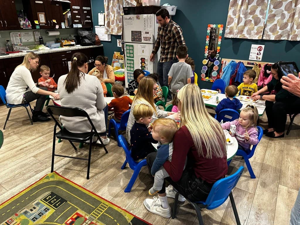 Family mealtime at Little Acorns Learning Center in Erie, PA