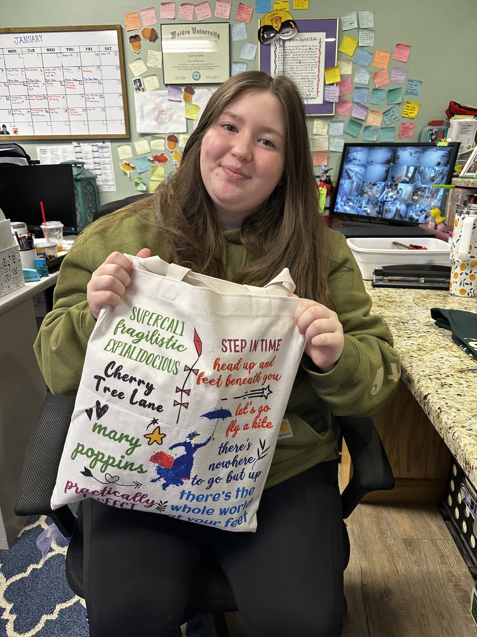 Little Acorns Difference Maker — assistant teacher with her Mary Poppins bag of classroom resources